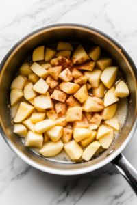 Cook the butter, diced apples, brown sugar, cinnamon,