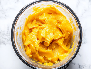Transfer the squash puree to a large skillet