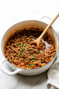 Warm the olive oil in a large Dutch oven over medium heat
