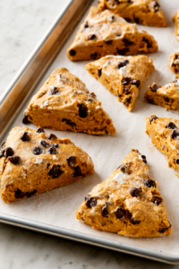 Brush the tops with heavy cream