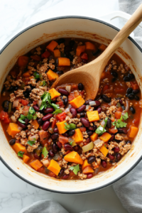 Add the diced sweet potatoes, black beans, kidney beans