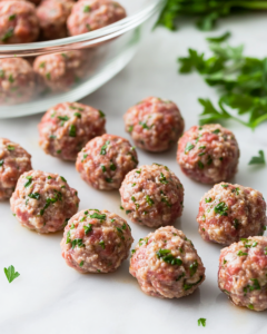 Roll the mixture into about 24 meatballs